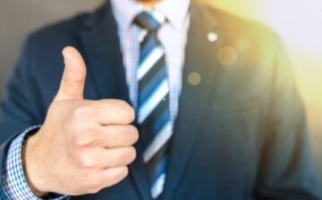 real-estate agent thumb up