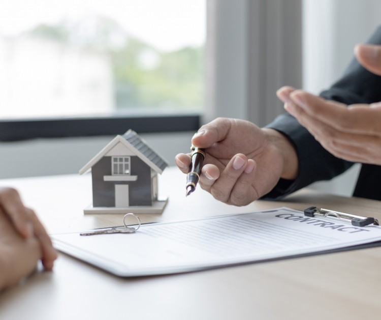 contract on a table with buyer