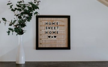 home sweet home sign on a wall