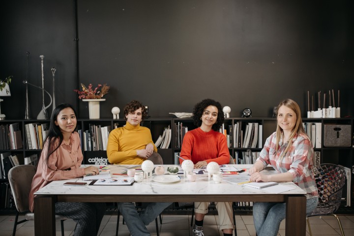 Small Businesses and Entrepreneurs seating around a table