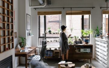 a woman standing in her home office