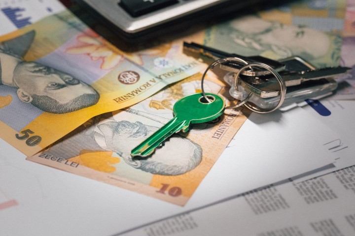 money in the box with keys to a new house