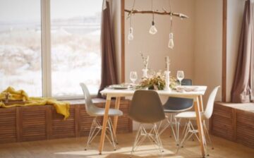 house painted in light colors and a small dining table