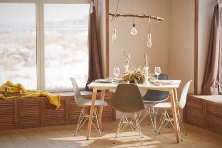 house painted in light colors and a small dining table