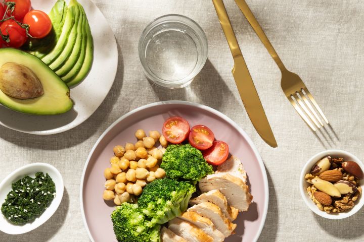 top view plate with keto diet food nuts 